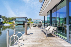 Lake House with dock at Lake Veere, Zeeland